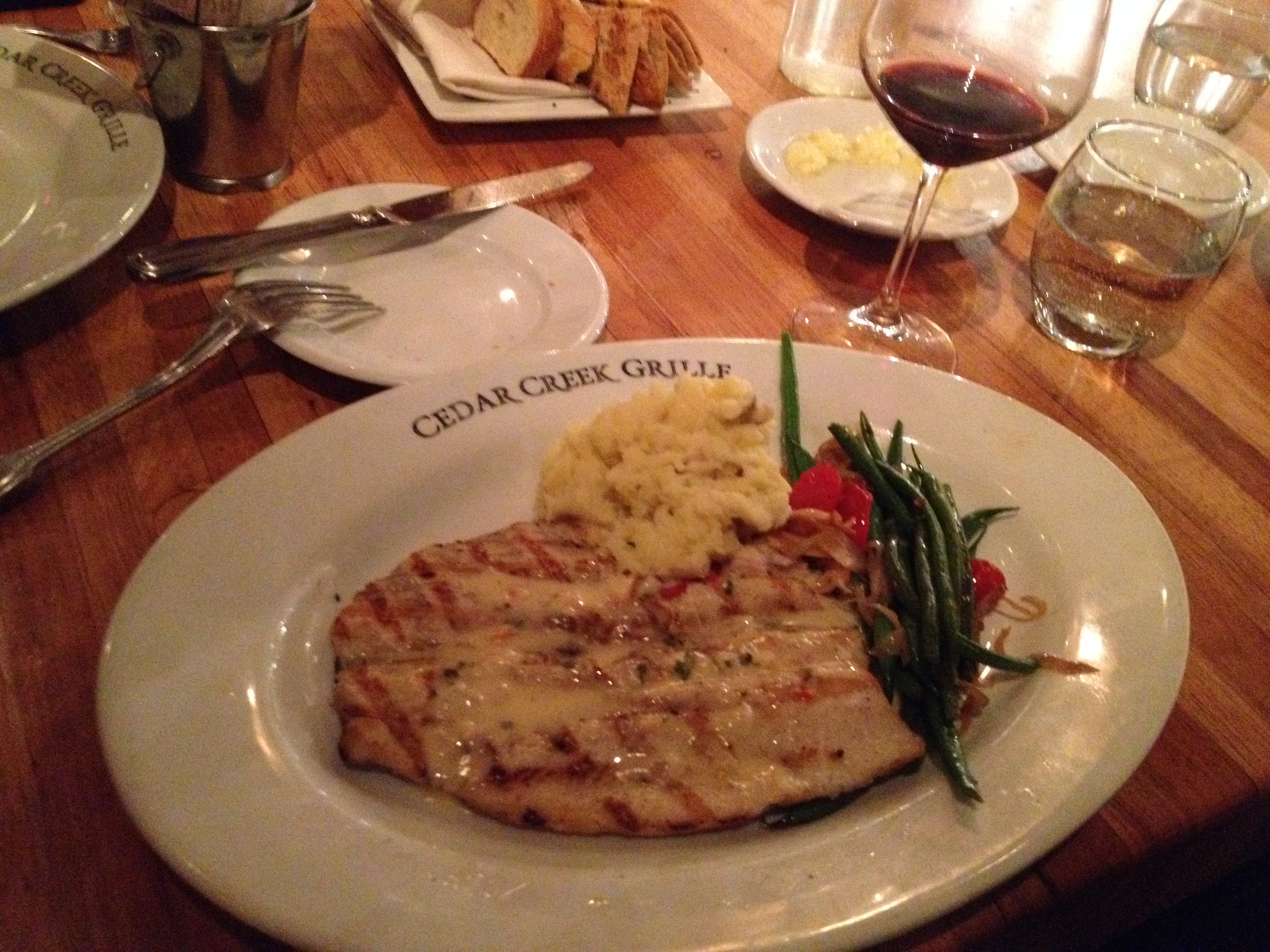Figure 1.  Cedar Creek Grille rainbow trout on the grill (lobster butter sauce, mashed yukon potatoes, spicy green beans).