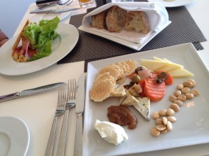 Figure 1.  Ohio artisanal cheese plate and bibb salad. Oh, what a cheese plate:  kokoborrego headwaters tome, yellow house blue, lucky penny goat, pickled vegetables, and house-made pear butter!