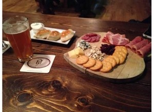 Figure 2.  Combo board and pierogies from the BottleHouse Brewery and Meadery.  This is the first city I have lived in where there are bona fide pierogies---how exciting!  The crackers that came with this combo, however, were not exciting (Ritz?).