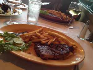 Figure 2. A serviceable New York strip steak open face sandwich at Larchmere Tavern.