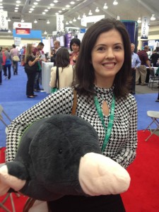 Figure 9. Dr. Nicole Restrepo wins big at a vendor’s wack-a-mole display. Well, at least we know where Nicole was…
