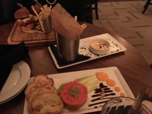 Figure 3. Left to right: the good (chicken sliders and shoestring fries with malt vinegar aioli) and the bad (tuna tartar).