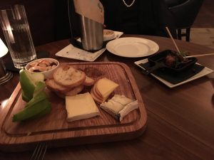 Figure 4. The cheese plate is pretty good. We also recommend the devils on horseback (medjool dates, chorizo, Applewood bacon, maple glaze).