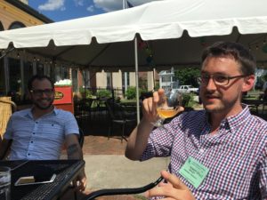 Figure 8. Nick Tatonetti, expert in biomedical informatics, data science, and microbrews, approves Mike Sivley's tasting choice. Johnny's Bar and Grille, South Hadley, MA.