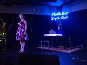 Figure. Claire Connelly, soprano, on Opera Night at the Music Box Supper Club. Yes, I see the piano player, but I forgot his name (sorry!).