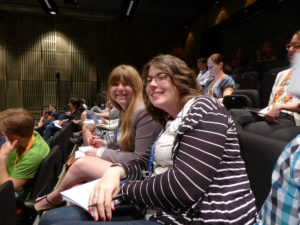 Figure 6. Graduate students Alex Fish and Corinne Simonti, diligently taking notes at the Keystone Symposia (Uppsala, Sweden).