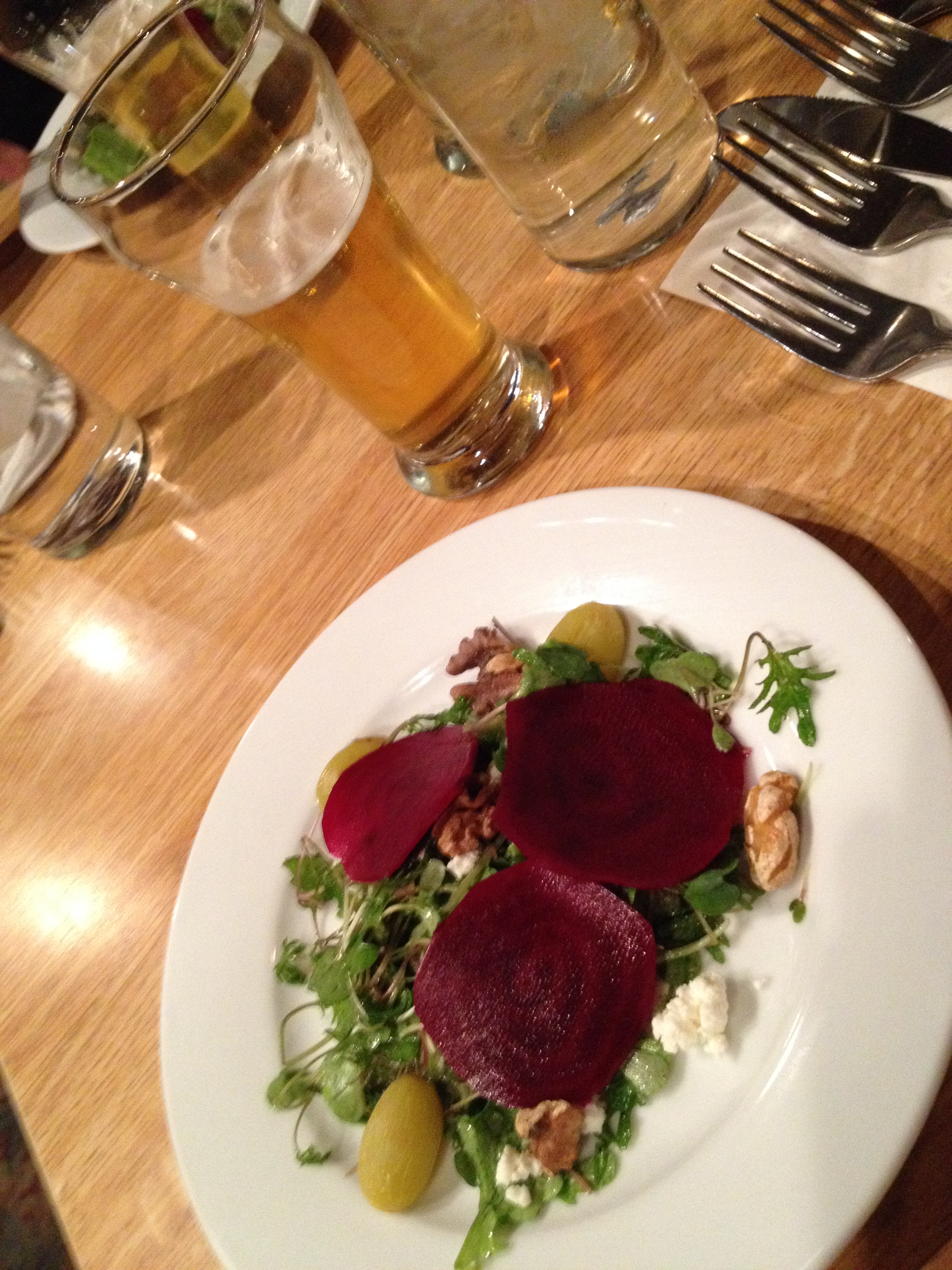 Figure 2. Course #2 was baby kale, goat cheese, shaved beets, ale poached grapes, toasted walnuts paired with Palesner (light bodied).