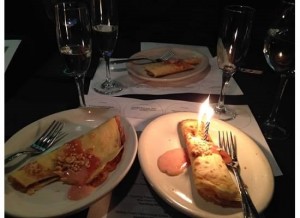 Nutella-filled orange crepe.  Yeah, I guessed I whined so much about the seating and my birthday that they had to bring a crepe with a candle in addition to a back-up crepe.  I was too stuffed to finish either one.  They probaby don’t like me now.